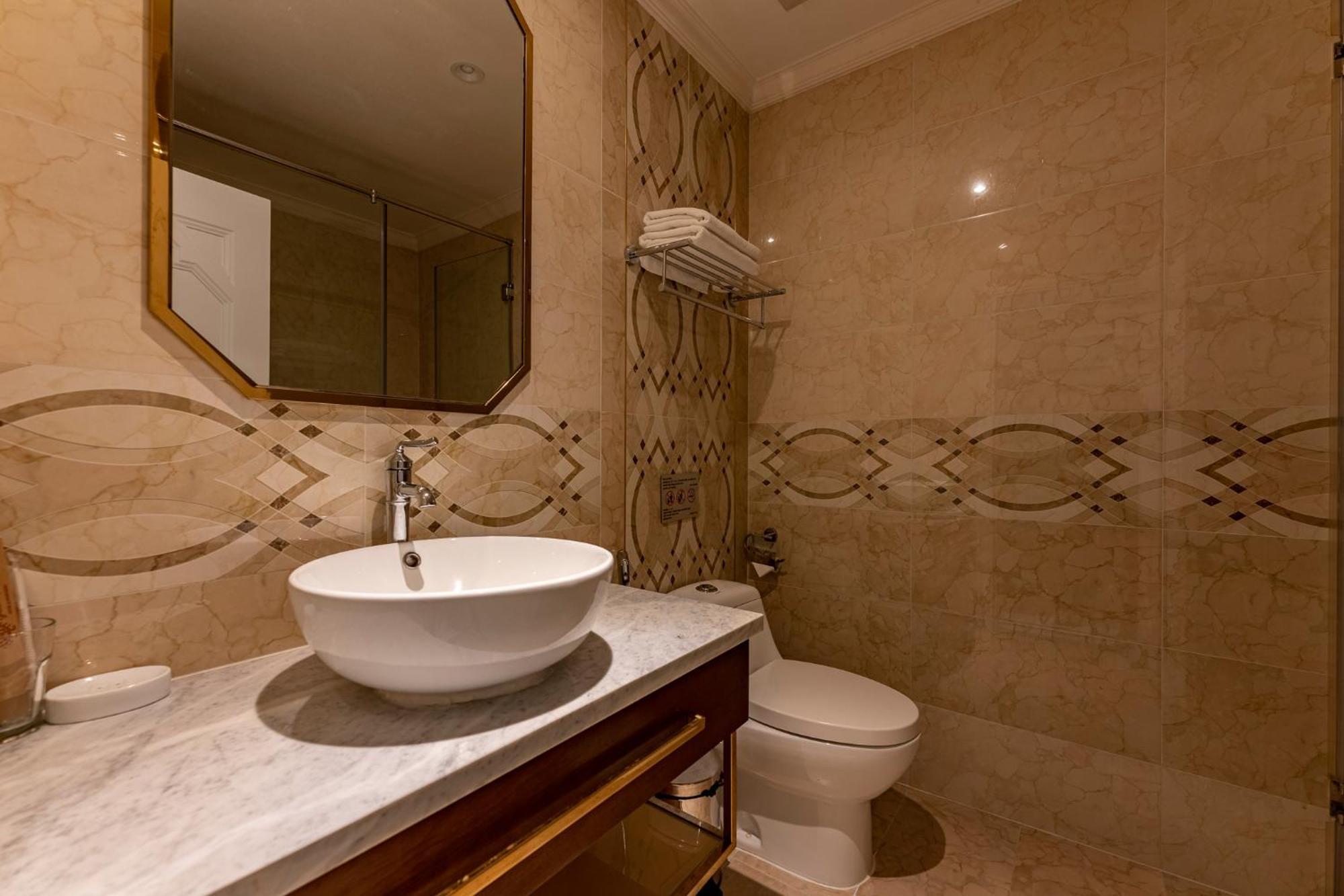 โกลเด้น ทรี โฮเทล แอนด์ อพาร์ตเมนต์ Hotel โฮจิมินห์ซิตี้ ห้อง รูปภาพ